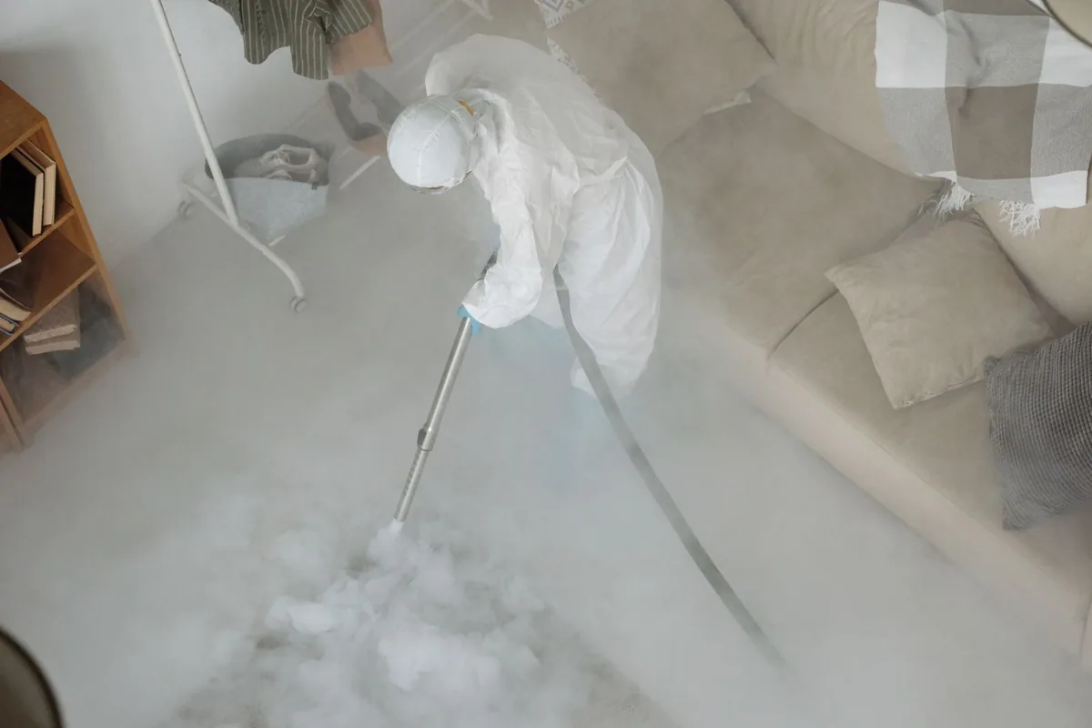 Biohazard cleanup technician in protective equipment, East Williston, NY